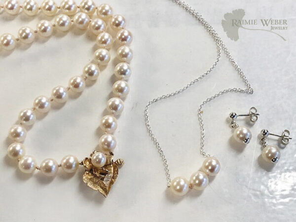 Beautiful necklace with three pearls and earrings that were taken from a alrger pearl necklace
