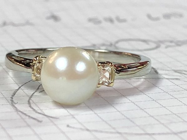 ring made from stud earrings and a solitaire pearl pendant