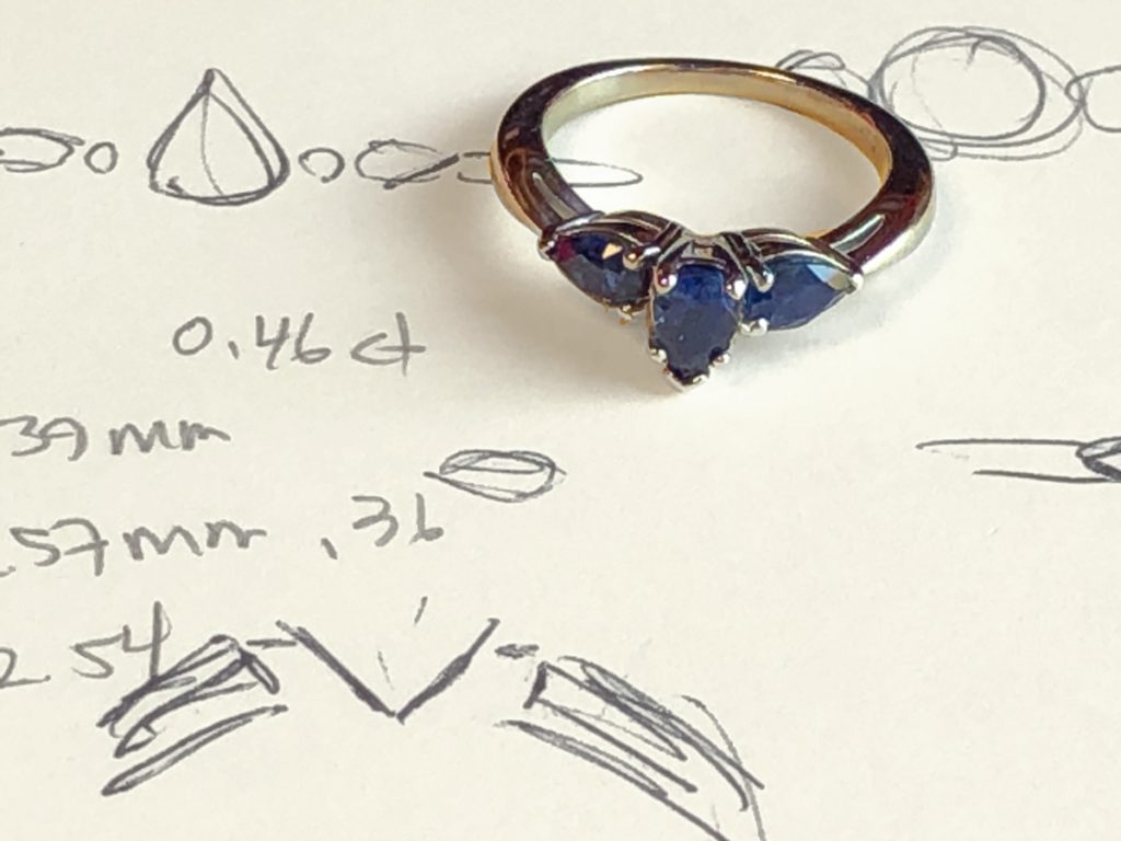 sapphire engagement ring with design notes
