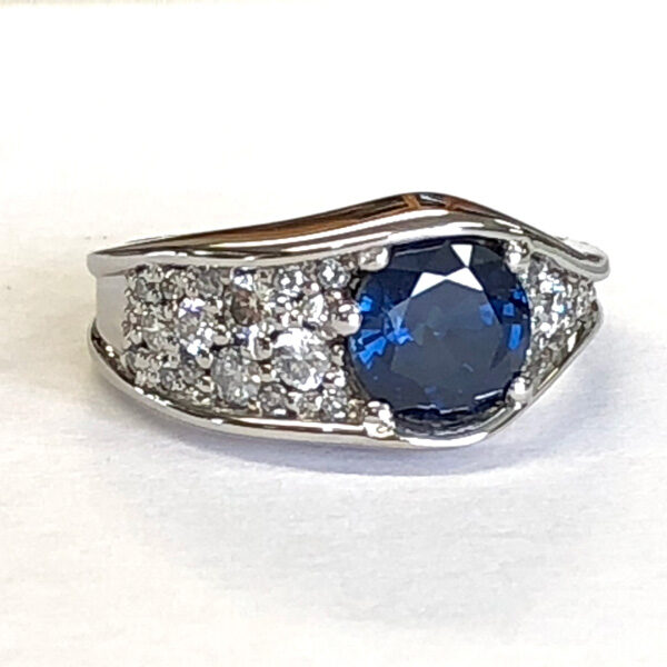 sapphire wave ring with pave diamonds