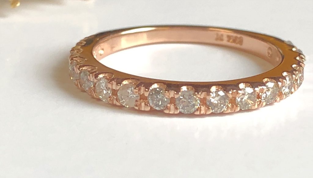 rose gold wedding band with 17 full cut diamonds