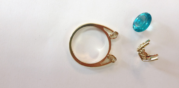 side view of parts for pariba colored apatite ring in 18k yellow gold