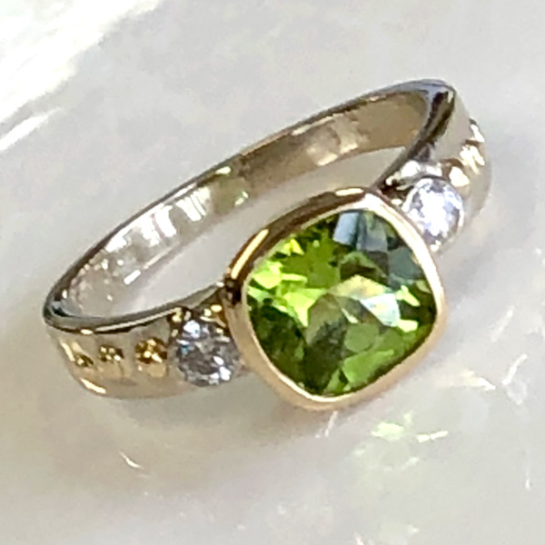 Streamlined redesigned square peridot engagement ring