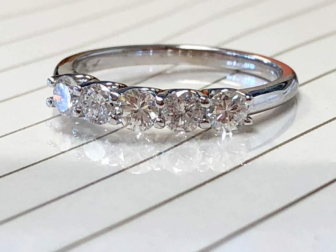 five diamond wedding ring remounted